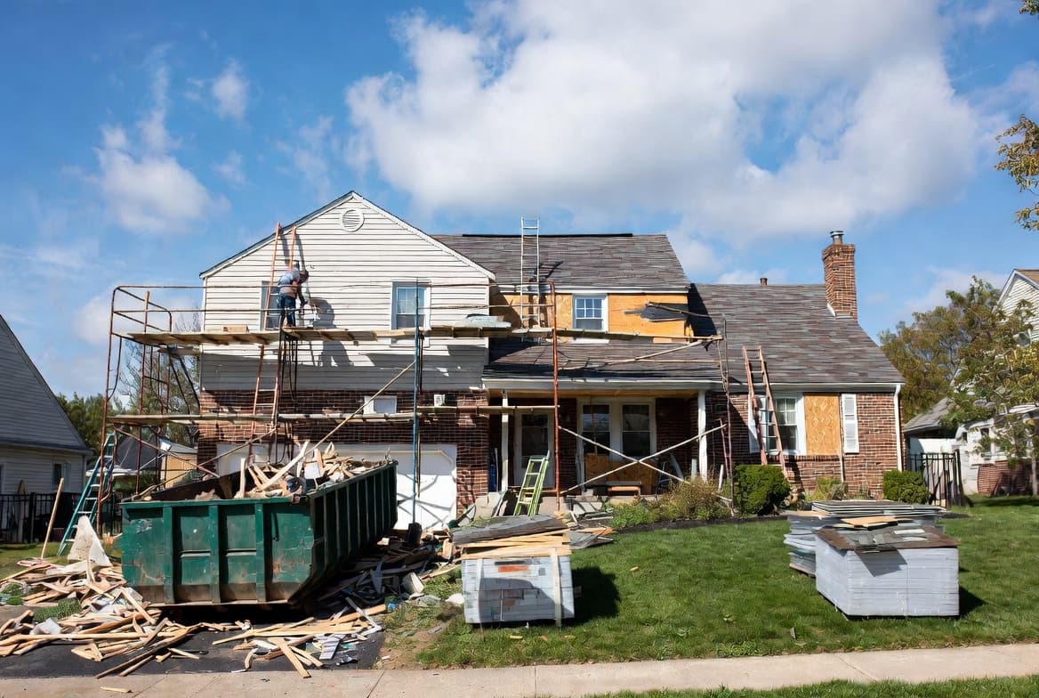Interior of a home mid-renovation with exposed framing